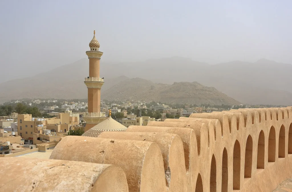 Nizwa Fort and the minaret of the Friday Mosque